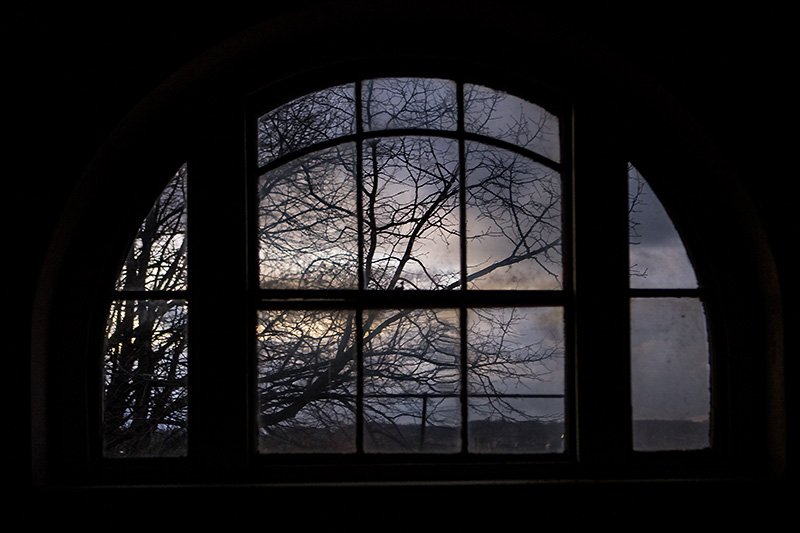 through the arched window