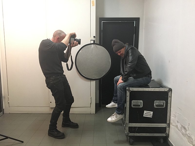 the happy hunchback taking photos